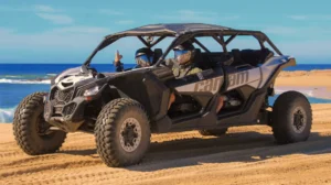 Can-Am Maverick X3 driving along the beach during extreme off road tour with ocean view in Los Cabos
