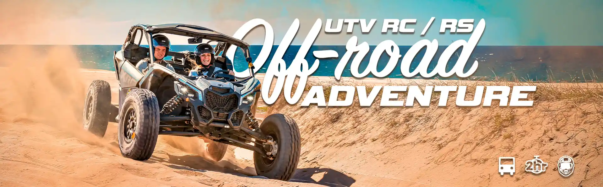 Couple driving a Can-Am Maverick RC during off road beach and desert tour in Los Cabos